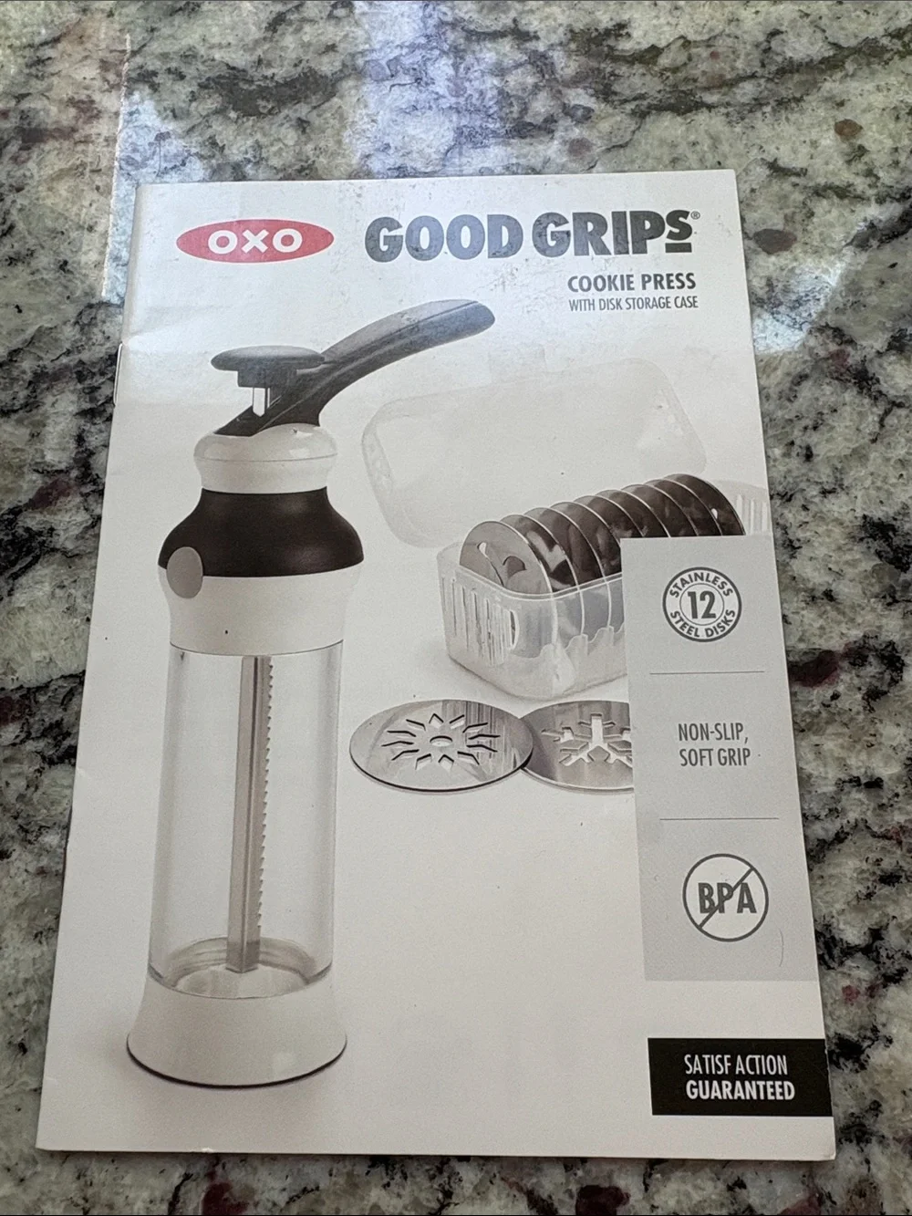 Oxo Good Grips Cookie Press with recipes and 12 discs. Used one time.